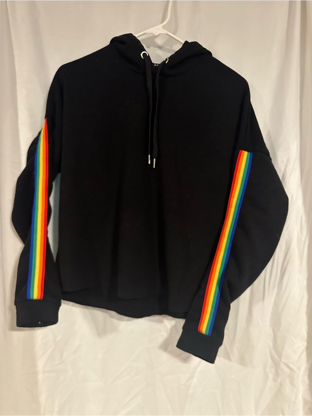 Justify Black Crewneck Sweater with Rainbow Sleeve Stripes